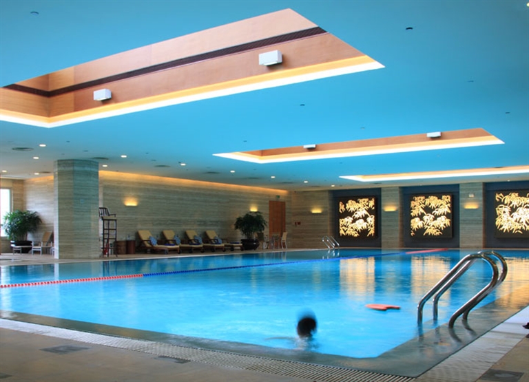 Swimming pool dehumidification